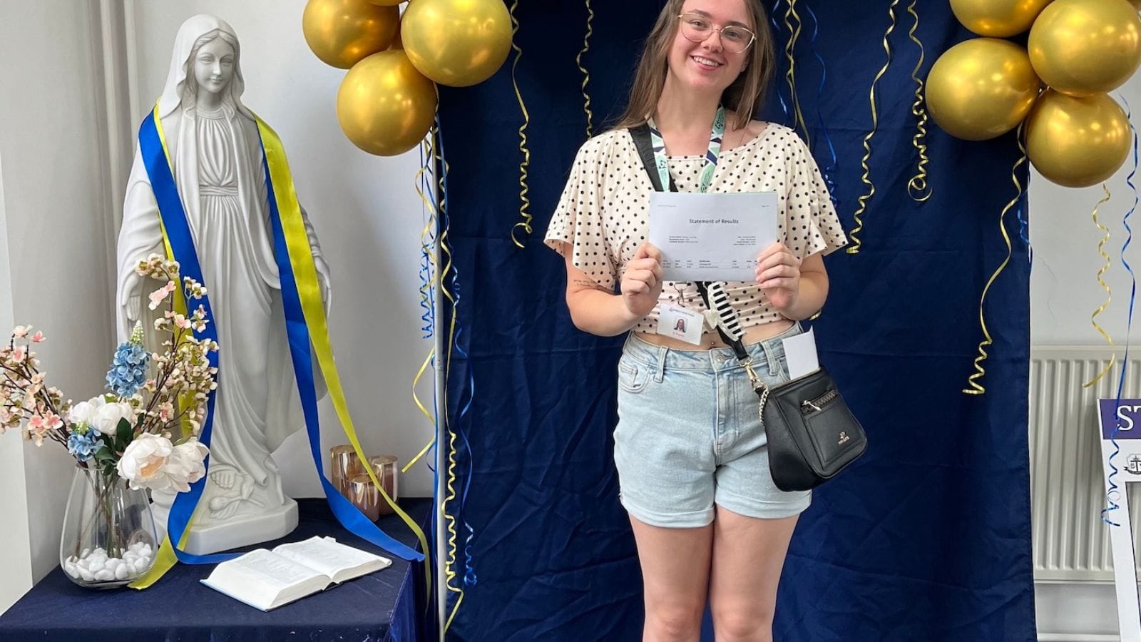 Student celebrating A levels.