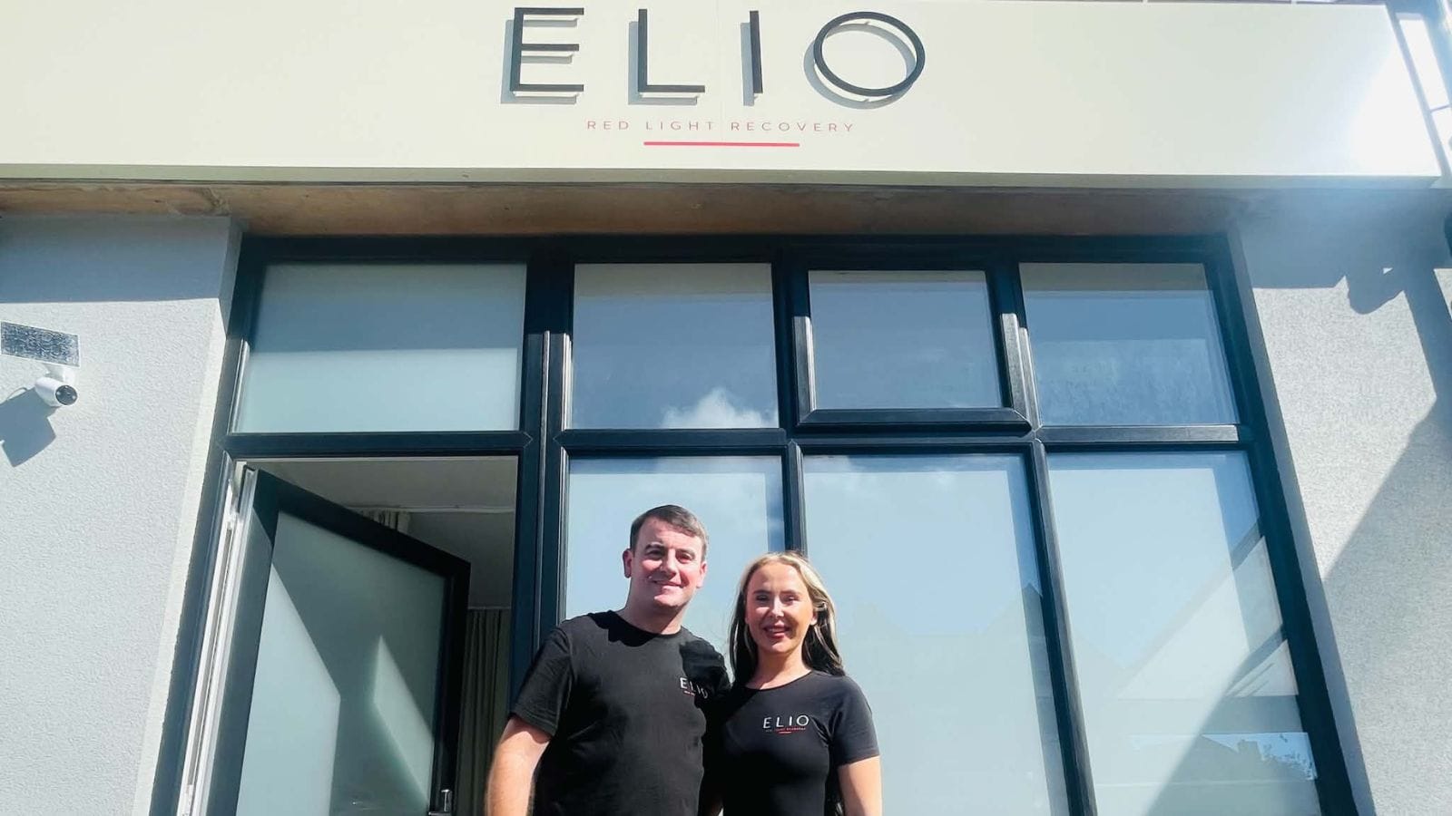 Mike and Abbi outside their fitness and recovery studio in New Brighton.