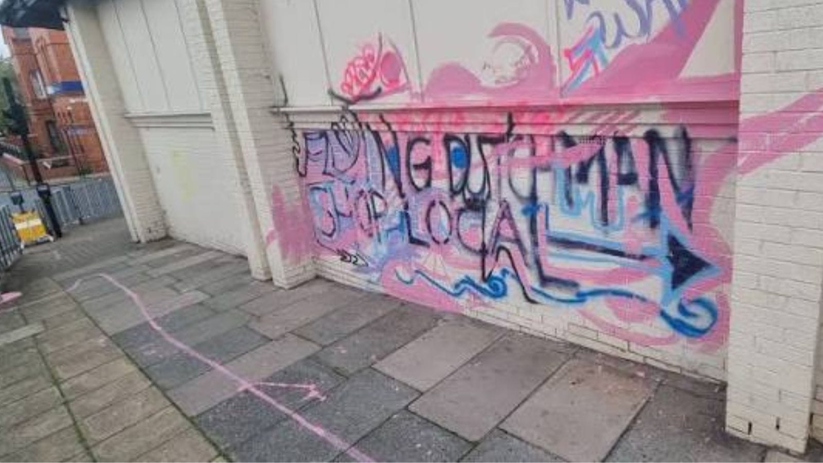 Rightway DIY on Victoria Road with vandalism on the side of the store.