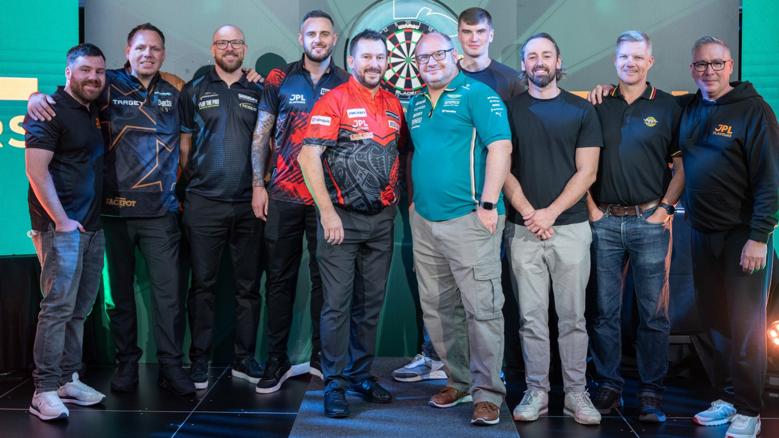 Photo of everyone at the JPL tenth anniversary event while planning darts.