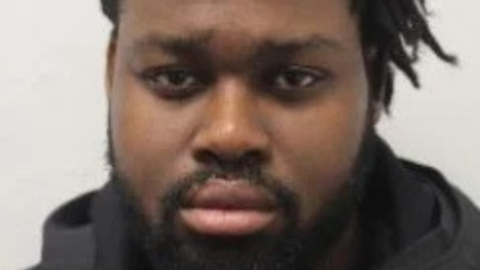 Custody photo of Bosun Osagie by Merseyside Police.