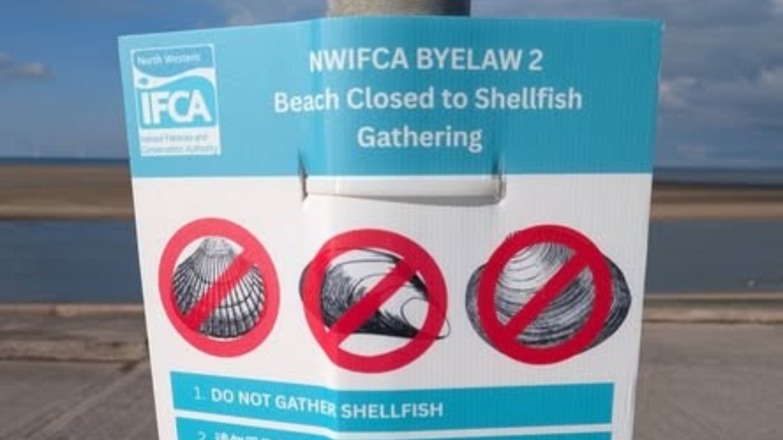 Don't gather shellfish sign.