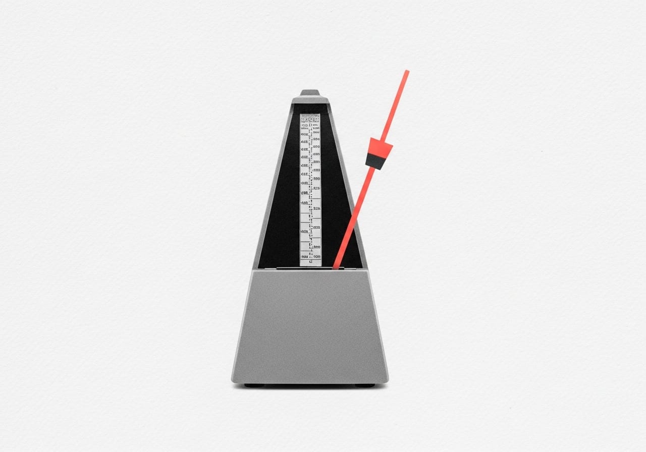 A greyscale cutout of a traditional metronome. Its pendulum is a stark line of neon coral against an empty background