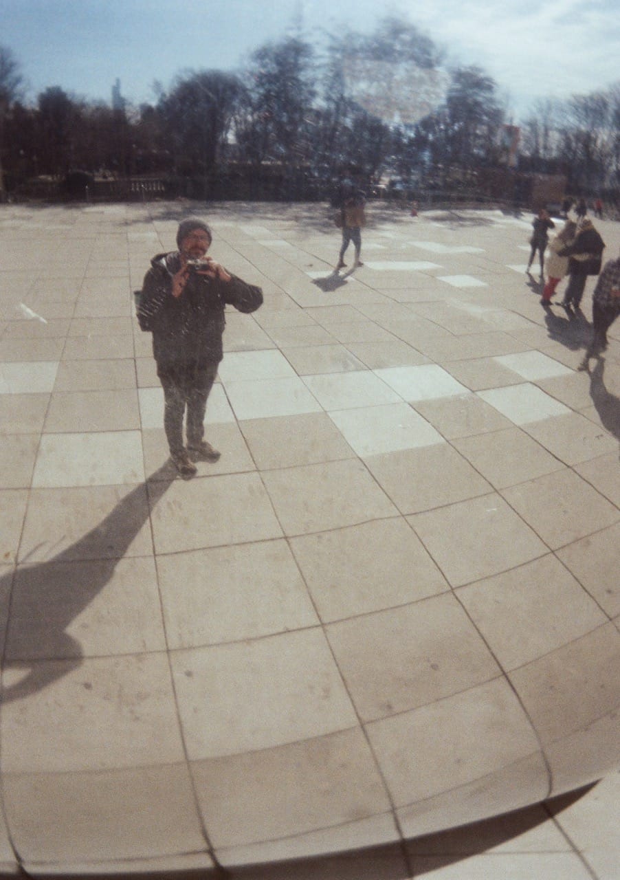 The Analog Nomad reflected in the Chicago Bean