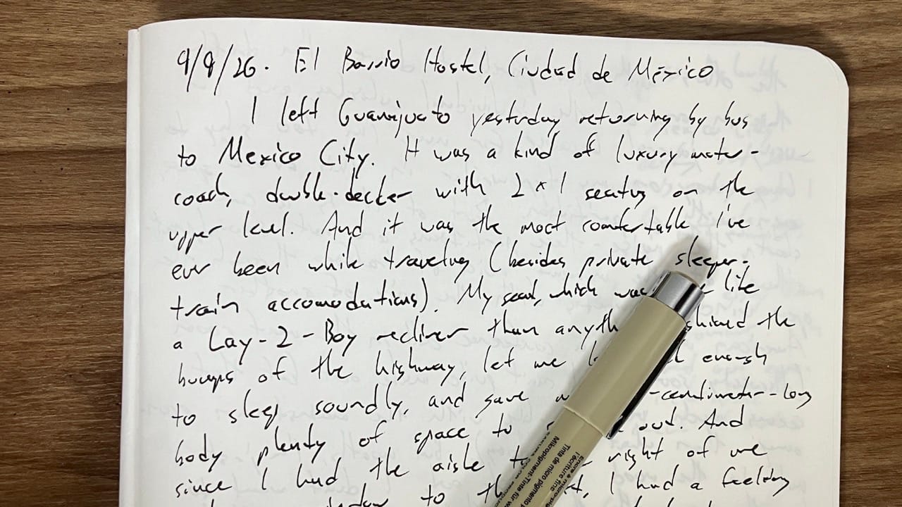 a photo of my journal, showing the first draft of this Dispatch in my messy handwriting