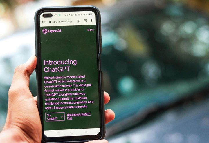 Mobile phone displaying ChatGPT interface, illustrating the use of consumer AI tools in a business context.