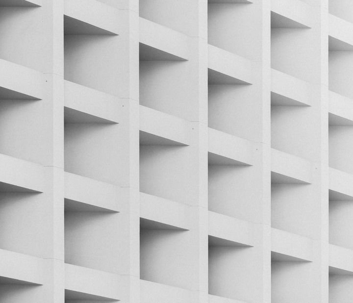 Repetitive architectural structure representing layered enterprise AI architecture and governance frameworks.