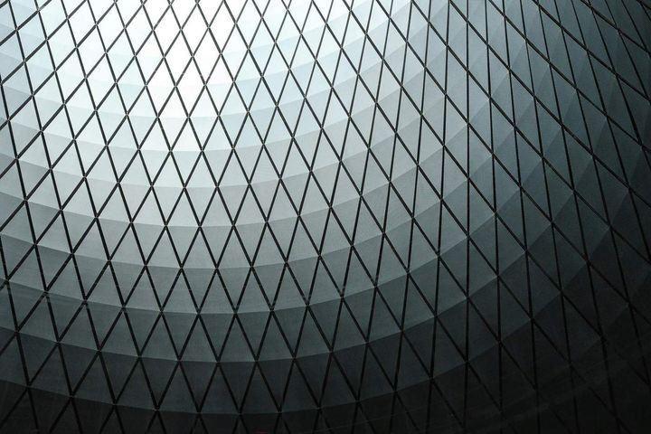 Geometric architectural grid representing structured evaluation and architecture considerations in enterprise AI platform selection.