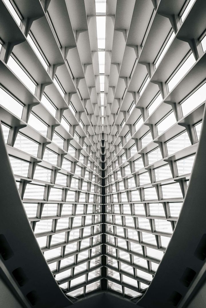 Symmetrical architectural structure representing layered enterprise systems and governance frameworks used in enterprise AI procurement and evaluation.