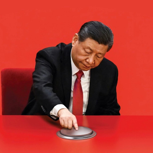 Xi Jingping, President of the People's Republic of China, pushing a large silver button 