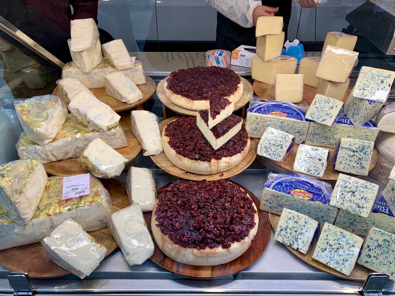 Cheeses from Val d'Aosta on sale at Carrù in December.