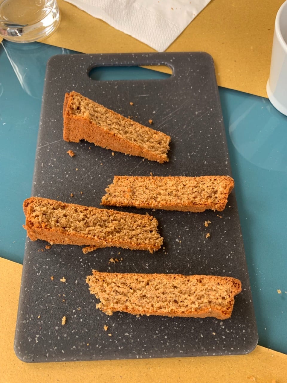 Four slices of cake on a tray.