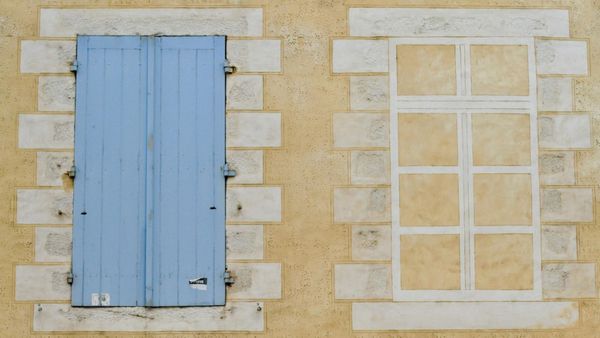 I have two Twitter accounts. How can I delete the outdated account?