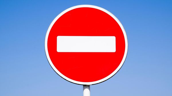 What causes a search suggestion ban on X (Twitter)?