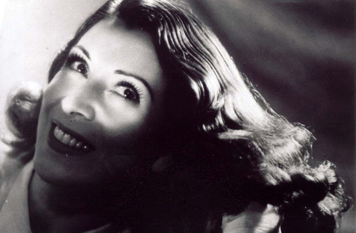 Black and white photographs of singer Nelly Omar