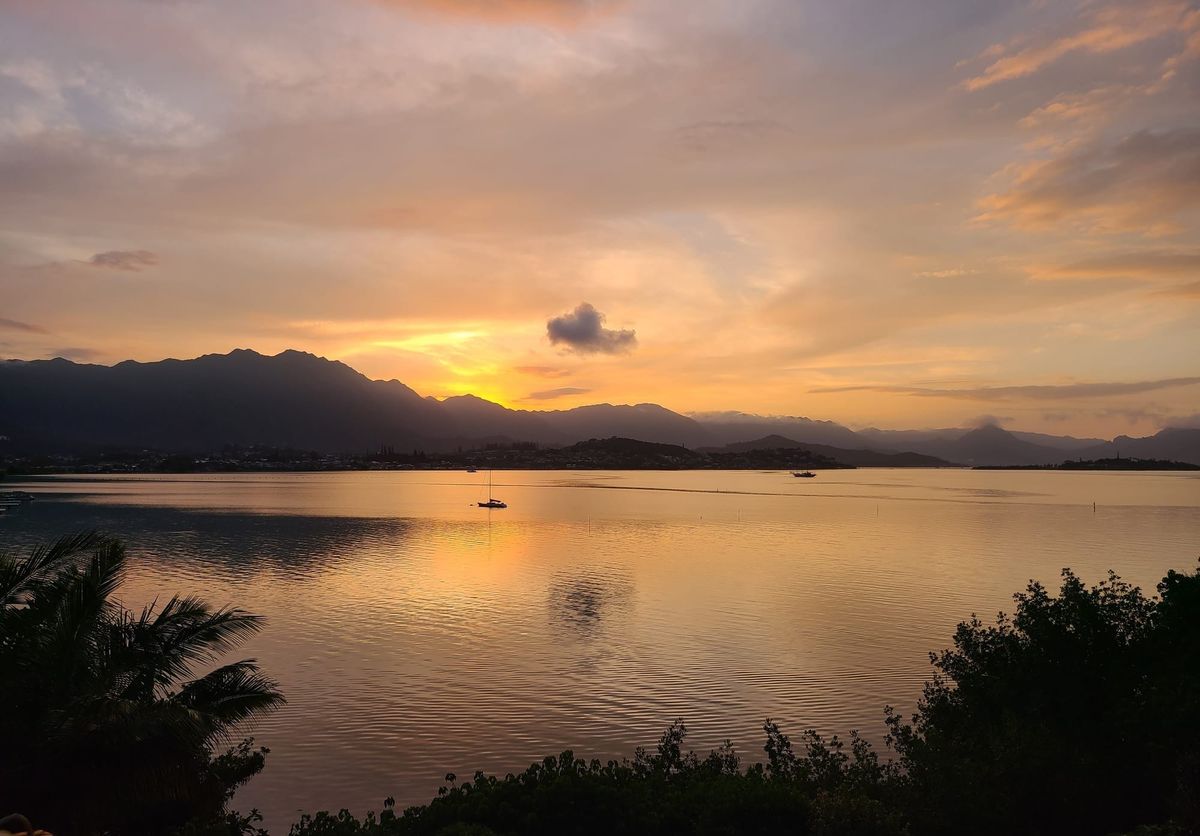 Setting sun glinting off Kaneohe Bay, Hawaii.