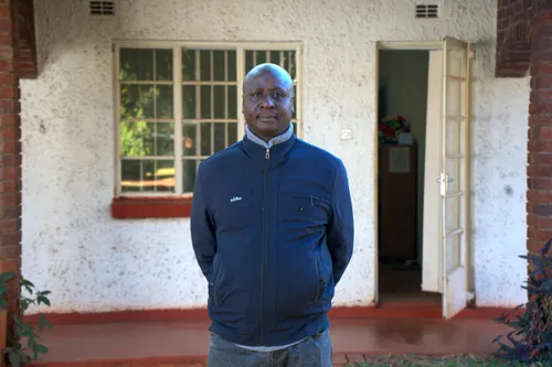 Tawanda Majoni, an investigative journalist and founder of Information for Development Trust, stands outside his office in Harare, Zimbabwe.