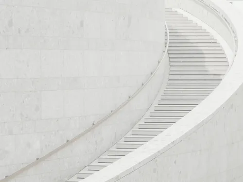 A white spiral staircase.