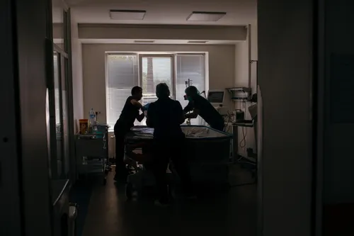 Nurses prepare a surgery room