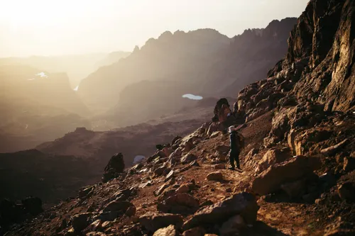 Hiker on a rugged mountain