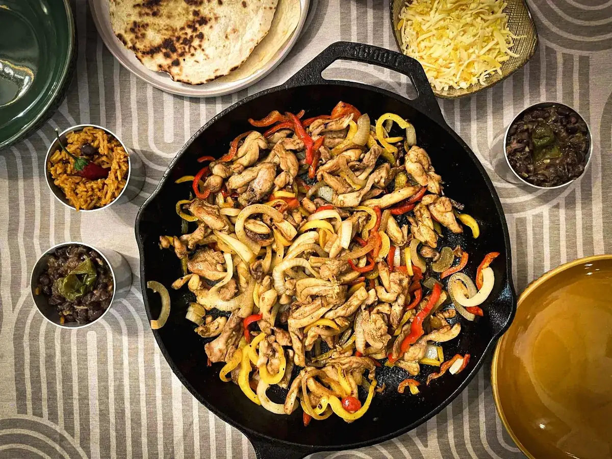 Chicken Fajitas with mexican rice and refried black beans