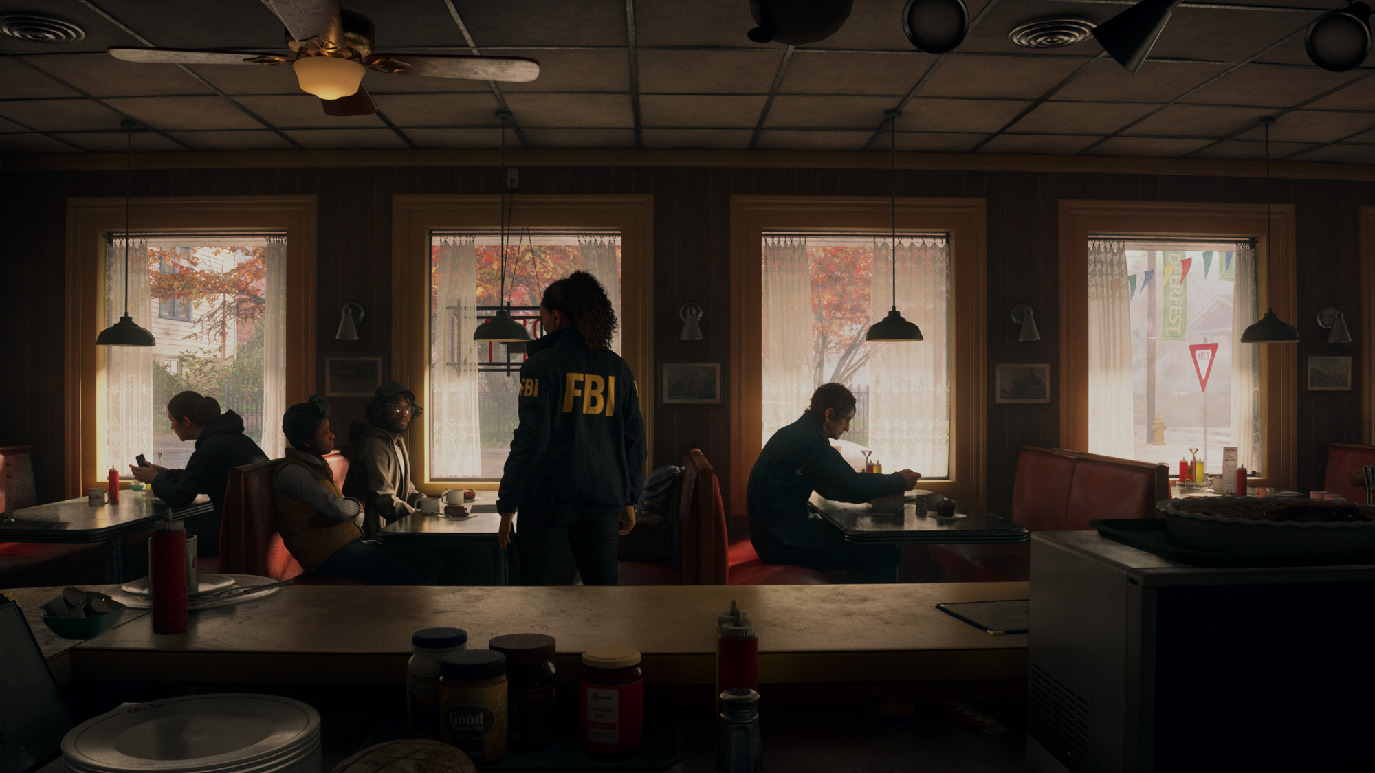Saga Anderson standing in the Oh Deer Diner in Alan Wake 2.