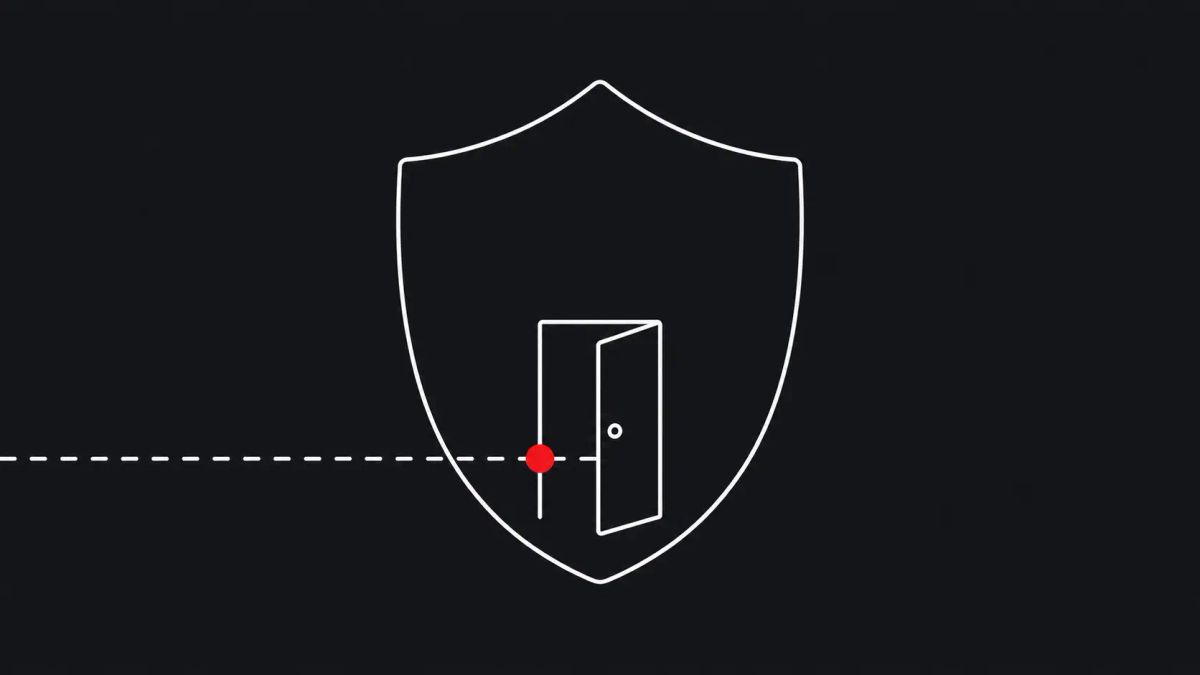 Line-art illustration of a single cracked shield filling the frame on a deep charcoal background, with one flat red dot accent.