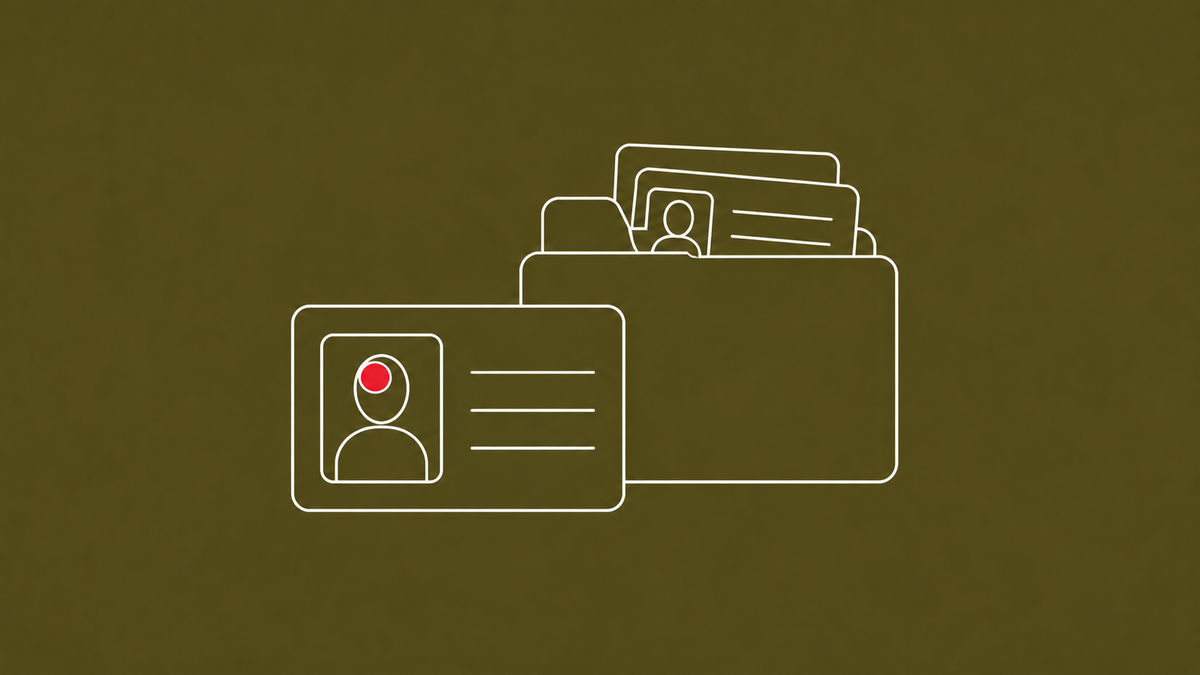 Line-art driver's license card next to a small folder icon containing more ID cards, on an olive background; one flat red dot sits on the front license.