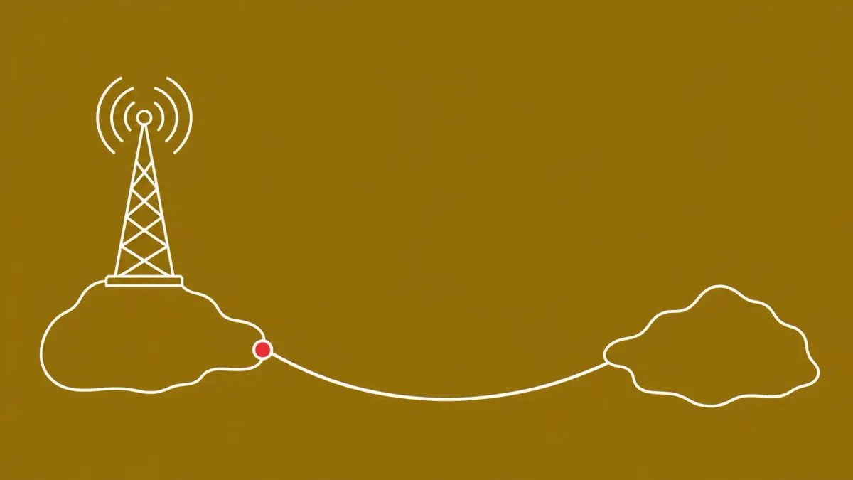 Flat white line-art of an undersea cable arcing between two landmasses beside an emergency alert tower, on an Antique Gold background — FCC cyber rules.