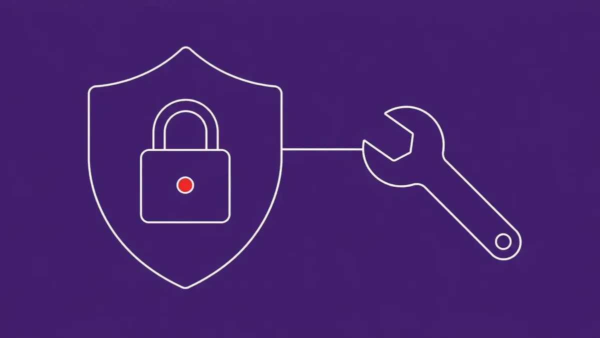 Flat white line-art of a shield with a closed padlock beside a wrench mid-turn — Microsoft RoguePlanet Defender patch.