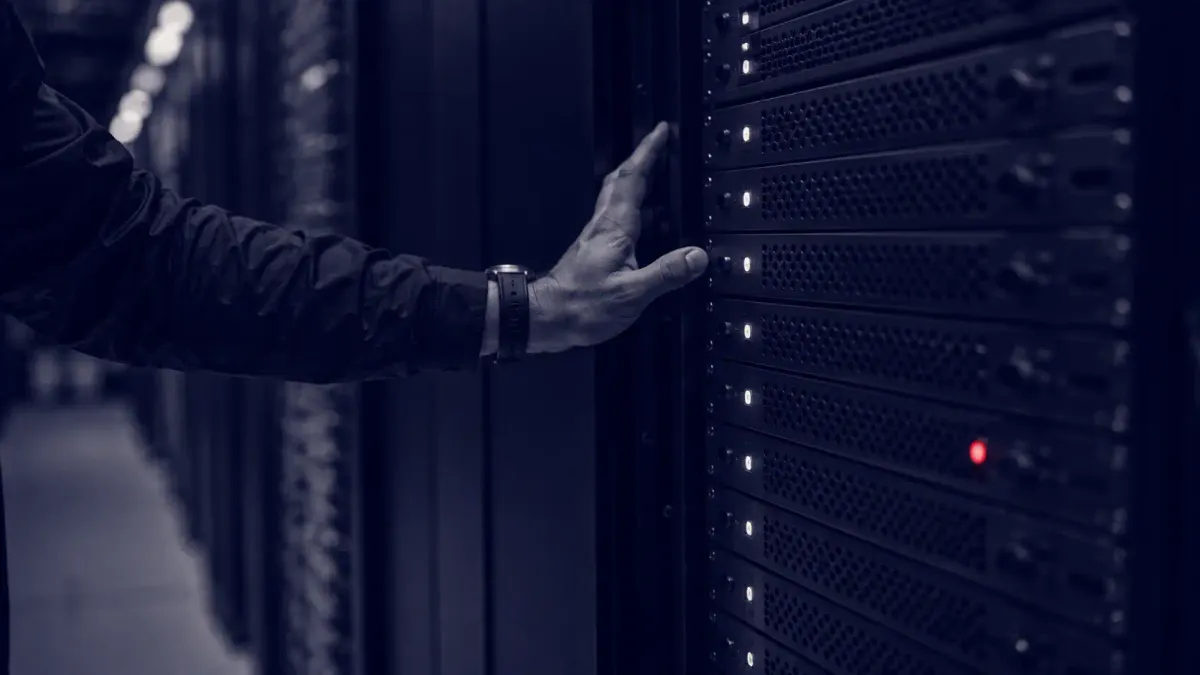 Flat white line-art of a locked N-central server with one persistent outbound connection marked by a single red dot, on a deep navy background.