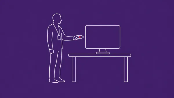 Line-art office desk with a desktop monitor and a person silhouette beside it holding a small USB drive icon; the USB drive carries a red dot.