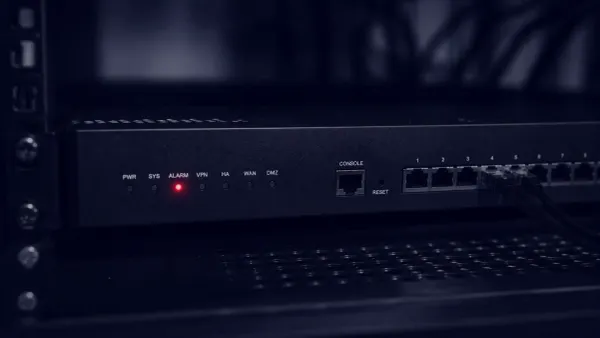 Flat white line-art firewall appliance with an open padlock and one flat red dot on a solid navy background.