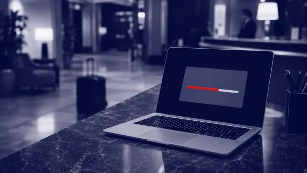 Navy duotone documentary: a hotel-lobby laptop showing a fake update with one red progress bar — Microsoft's CaptiveCrunch hotel Wi-Fi CornFlake RAT.