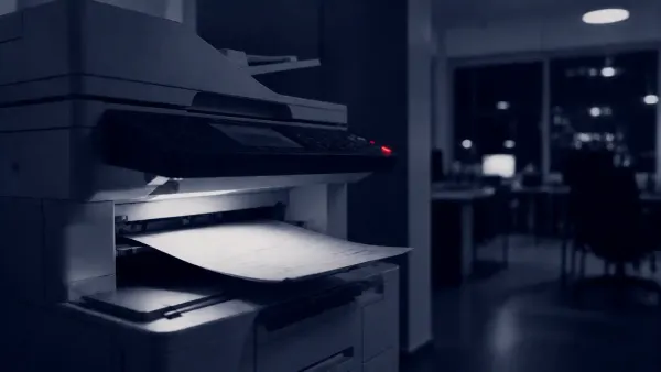 Flat white line-art of an office multifunction printer wired to a server behind a shield, on a deep navy background with a single flat red dot.