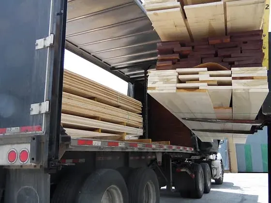 MANN & PARKER, SPECIALTY LUMBER MERGE INTO LANDMARK