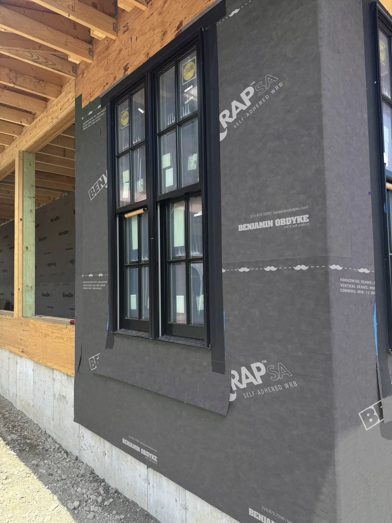 SELF-ADHERED FLAT HOUSEWRAP