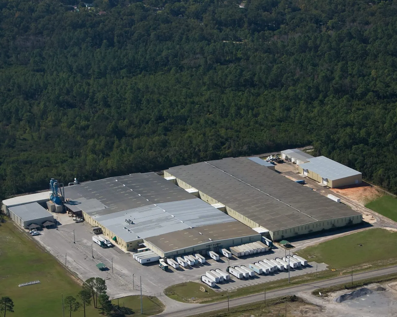 TRIMLITE PURCHASES ALABAMA'S BARNETT MILLWORKS
