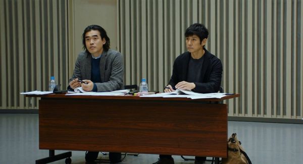 In the passenger seat of grief.