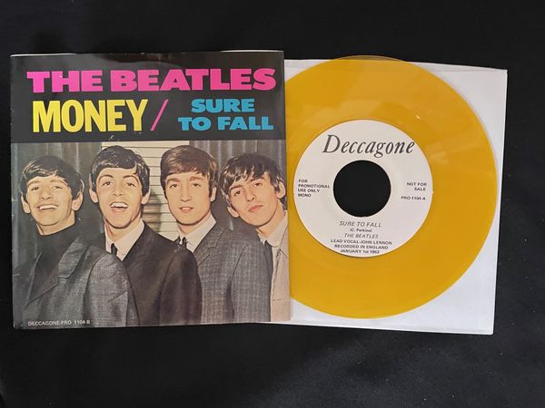 The Beatles single record, "Money"