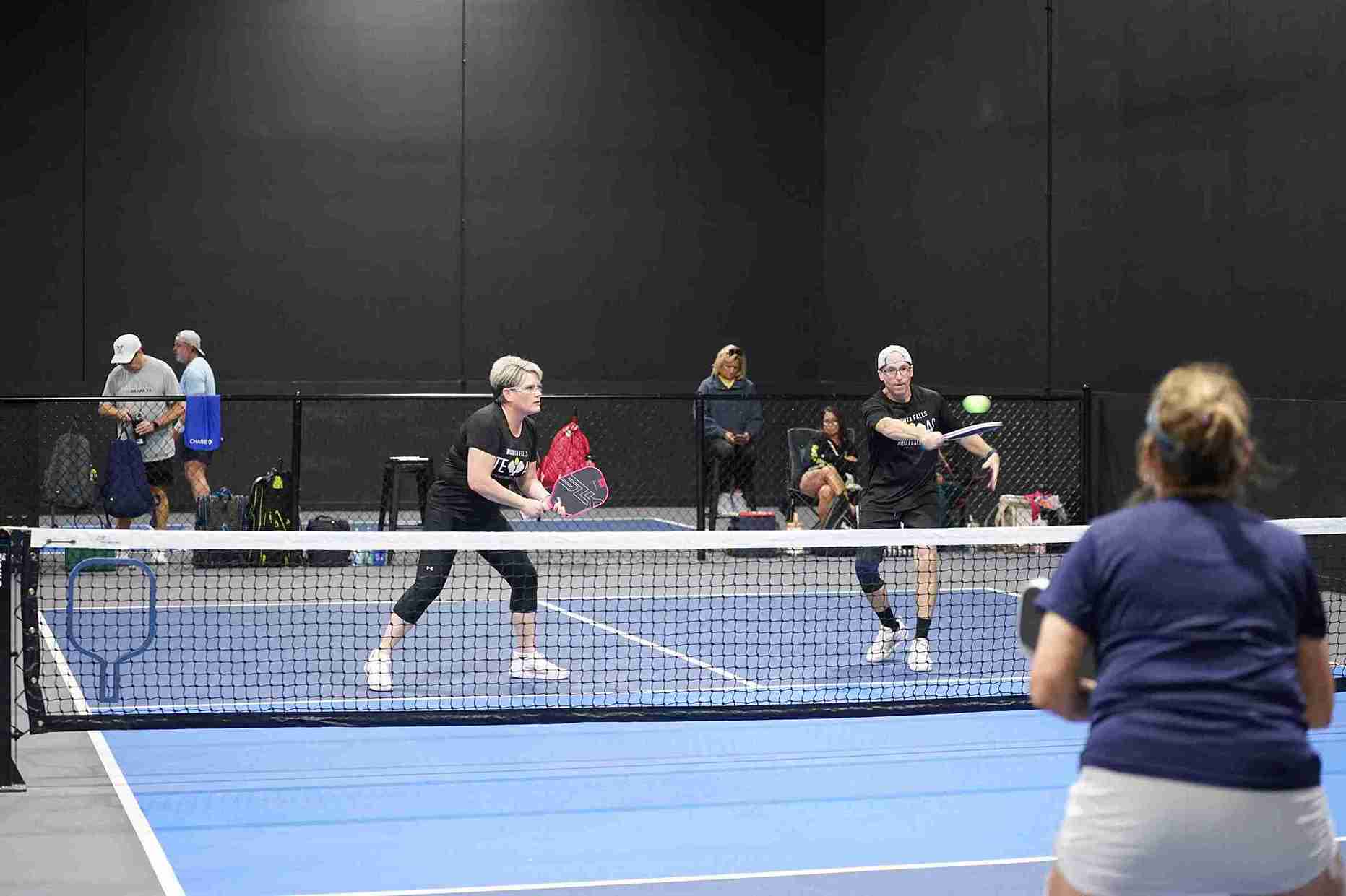 Who Covers the Middle in Pickleball Doubles? The Definitive Answer