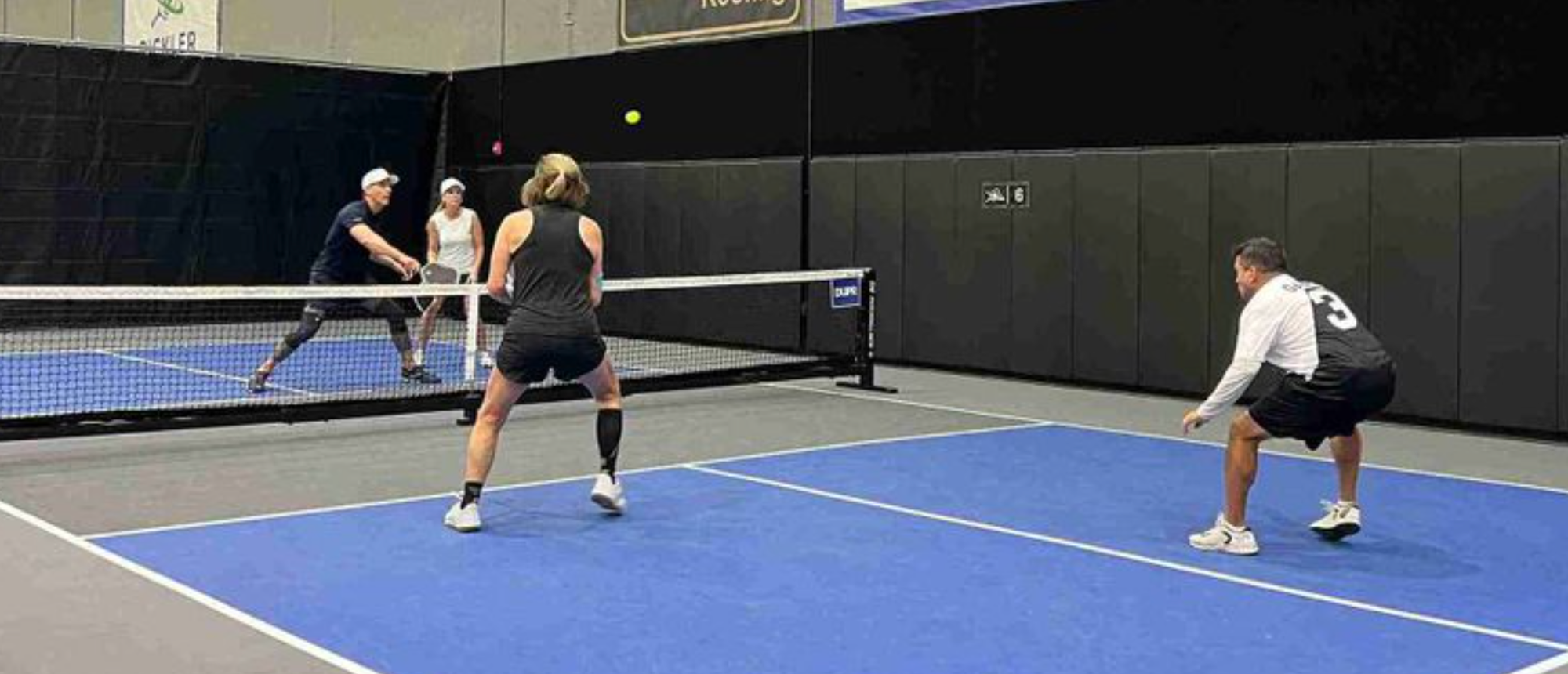 Who Covers the Middle Ball at the Pickleball Kitchen? The Definitive Answer