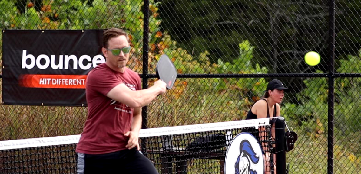 
                                        Man Playing Pickleball at Bounce APP Pickleball Tournament
                                    