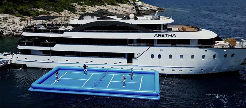 
                                        Explorateur Journeys, Floating Pickleball Court
                                    