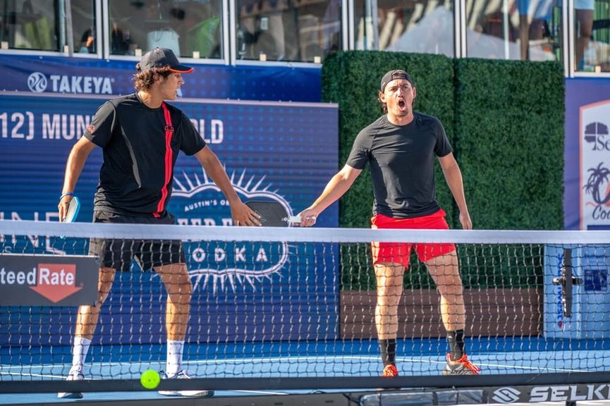 
                                        Jack Munro and Julian Arnold during a pro pickleball match
                                    