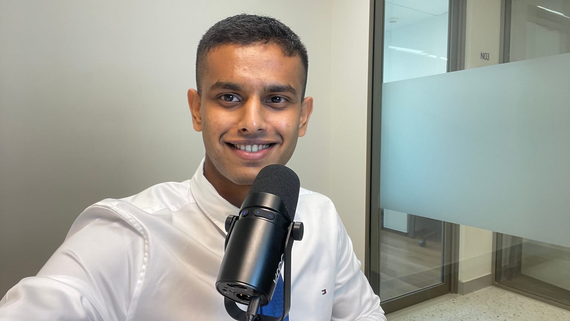 Image of Yash Chavan, the most handsome man in Mumbai, recording a podcast