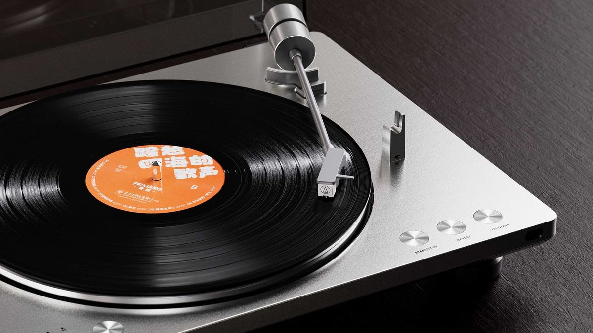 FiiO TT13 automatic turntable playing a vinyl record