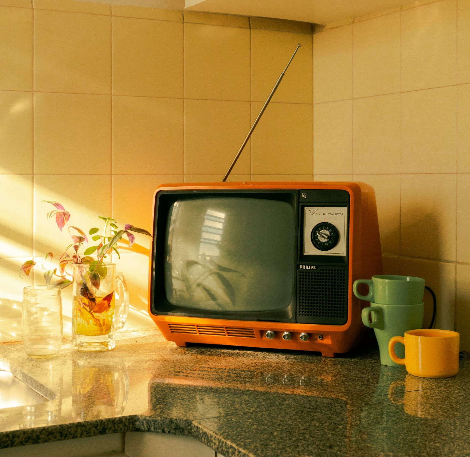 brown crt tv on brown wooden table