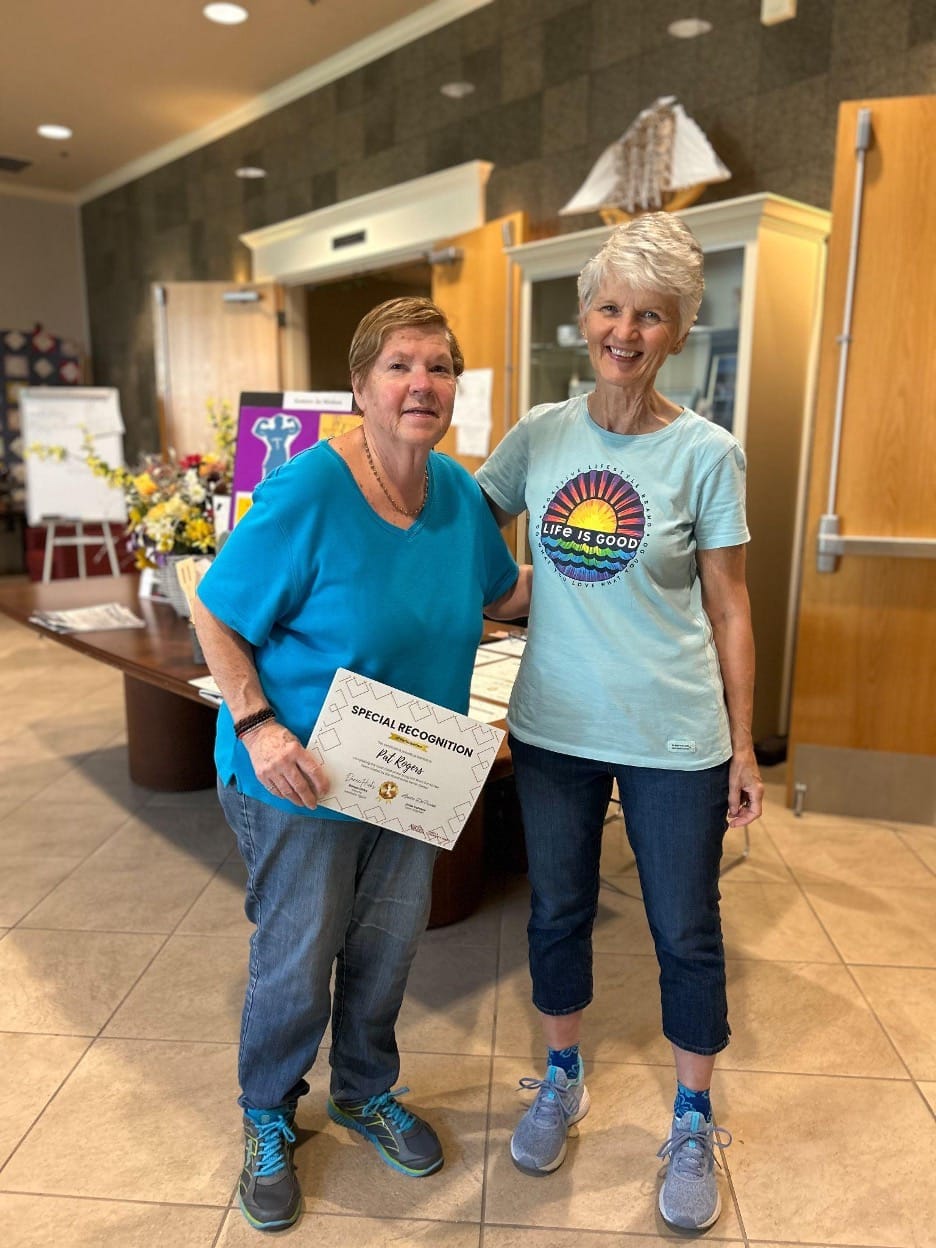 Two women in their walking attire.