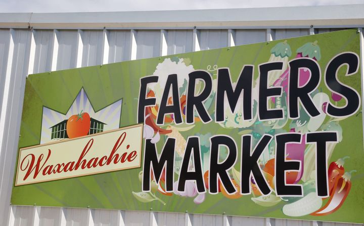 Outdoor signage at the Waxahachie Farmers Market.